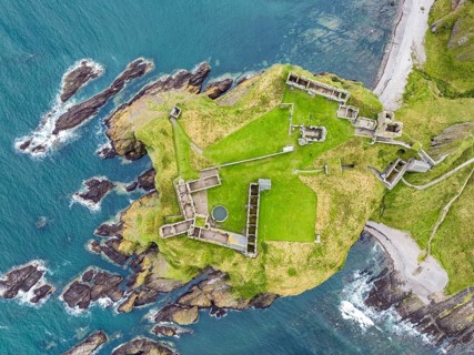 Aerial view of Dunnottar Castle ruins on the North Sea coast, Stonehaven, Aberdeenshire, Scotland,