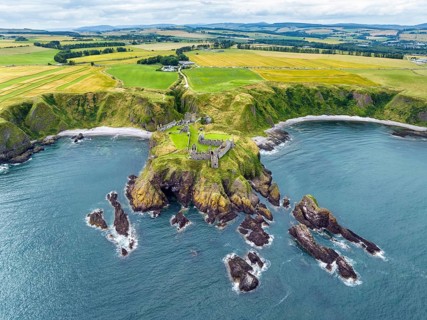 Aerial view of Dunnottar Castle ruins on the North Sea coast, Stonehaven, Aberdeenshire, Scotland,