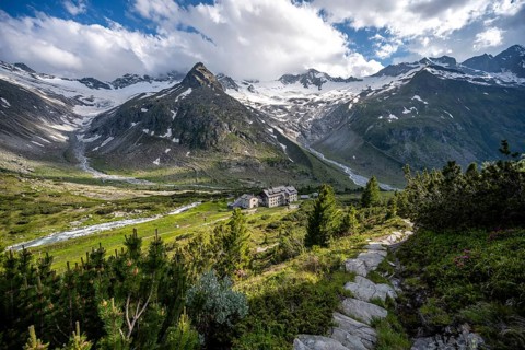 Mountain landscape with hiking trail, mountain hut Berliner Hütte, mountain peak Steinmandl,