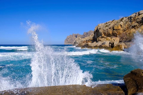 Wave and spray, Cala de Sant Vicenc and Cape Formentor, Pollença, Serra de Tramuntana, Majorca,