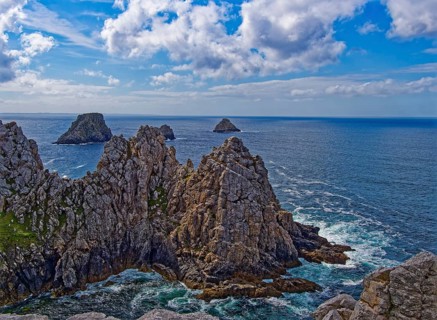 Formation of rugged rocks at Pointe de Penhir, a cape on the Crozon Peninsula, on the Atlantic