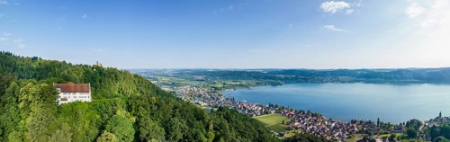 Aerial panorama of Lake Constance with Frauenberg Castle, also known as Frauenberg Castle, behind
