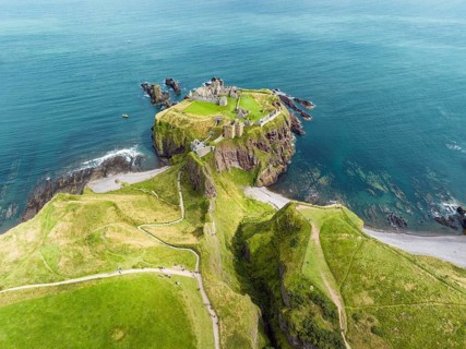 Aerial view of Dunnottar Castle ruins on the North Sea coast, Stonehaven, Aberdeenshire, Scotland,