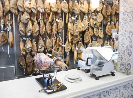 Close up display of cured hams inside a specialist shop in Barrio Macarena, Seville, Spain, Europe