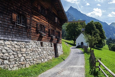 Old farmhouse and chapel in the historic mountain farming village of Gerstruben, Dietersbachtal,