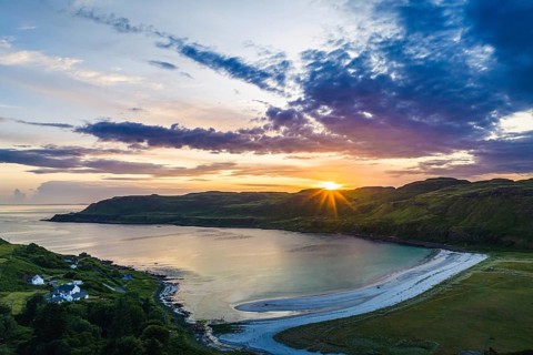 Sunset over Calgary Beach and Bay from a drone, Isle of Mull, Scottish Inner Hebrides, Scotland, UK