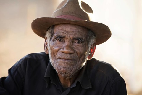 Close up portrait of Malagasy old man with hat in Bekopaka, Antsalova, Melaky, Madagascar,
