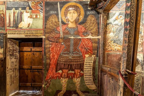 The painted interior of the barn-roofed Church of Archangelos Michail or Church of St. Michael the