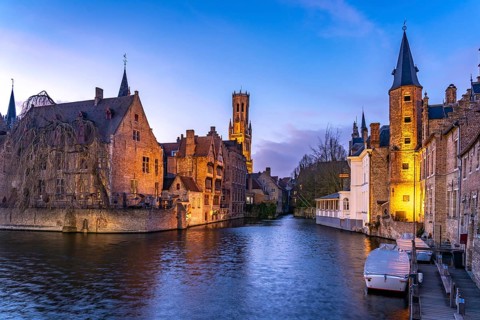 Rozenhoedkaai canal with belfry at dusk, Bruges, Belgium, Europe