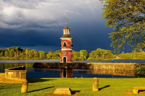 Lighthouse at the Fasanenschlösschen in Moritzburg with thunderstorm sky