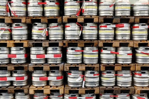 Pallets stacked, many beer barrels labelled with deposit, full-size, Warsteiner Brewery, Warstein,