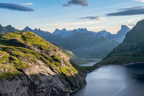 Mountain landscape with lake Tennesvatnet, view of fjord Forsfjorden with village Vindstad, at