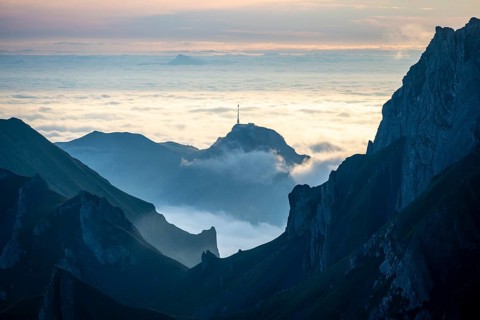 Hoher Kasten and mountains at sunrise, high fog in the valley, view from SÃ¤ntis, Appenzell