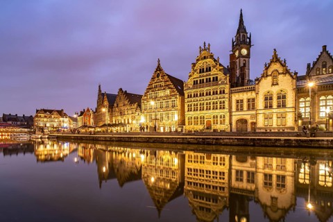 Medieval guild houses of Graslei Kai on the river Leie at dusk, Ghent, Belgium, Europe