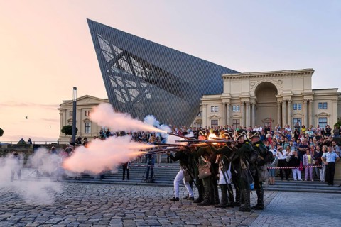 Combat drill and battle reenactment in front of the Dresden Military History Museum. Numerous