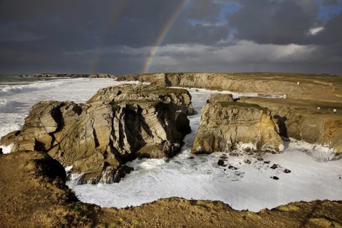 Rainbow during storm at sea, Côte Sauvage, Quiberon, Brittany, France, Europe
