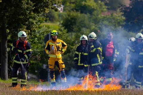 During controlled field fires, the firefighters were able to test various extinguishing methods,