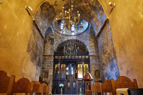 Super wide angle, interior church, icons, tunnel vault, ochre walls, chandelier, altar wall, rows