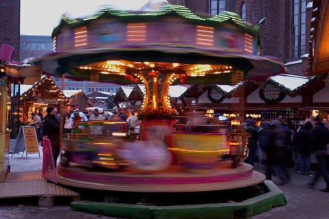 Europe, Germany, Hamburg, Christmas market in front of St Peter's Church, Children's carousel,