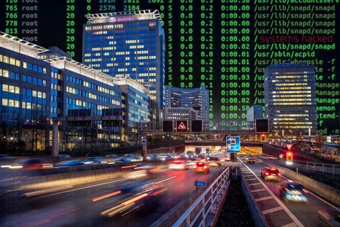 Symbolic image cyberattack, computer crime, cybercrime, computer hackers attack a city's IT