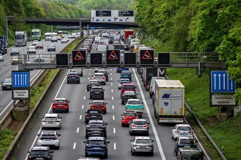 The A3 motorway, heavy traffic on 8 lanes, including the temporarily open hard shoulder, in front
