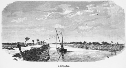 Towing, barge being pulled, on the Vistula or Wisla, Poland, river landscape, towpath, pulling,