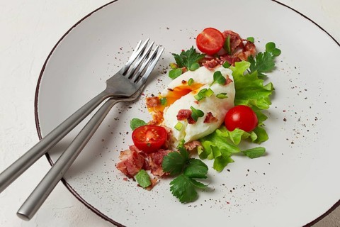 Poached egg, with bacon and vegetables, breakfast, homemade