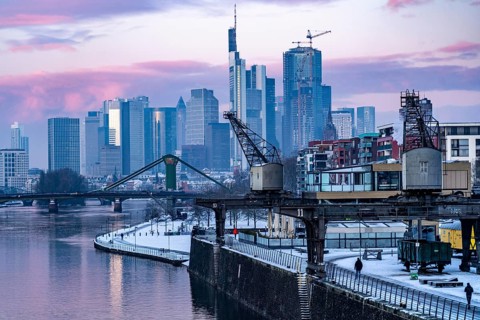 The skyline of Frankfurt am Main, skyscrapers of the banking district, historic harbour cranes at