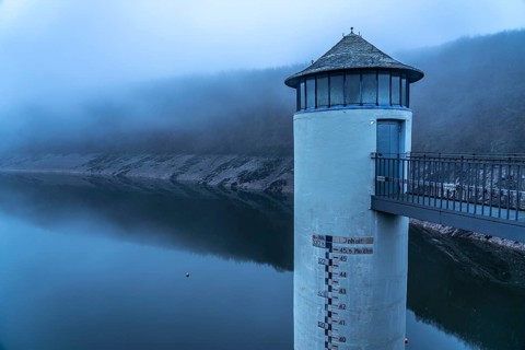 The dam wall of the Urft dam, in the Eifel, reservoir, in winter, fog, near Schleiden, North