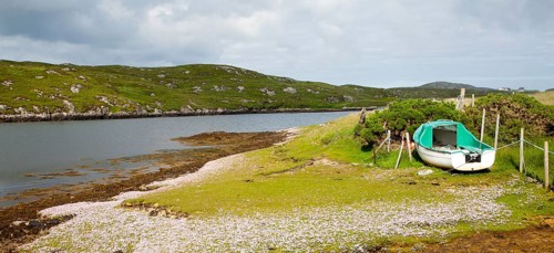 Small fishing boat on the east coast of Barra, Outer Hebrides, Scotland, UK