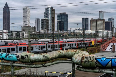 Mainova district heating line, local trains on the track in front of Frankfurt am Main main