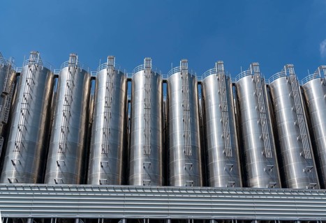Stainless steel tanks of a large silo facility in Duisburg inland harbour, Duisburg-Neuenkamp, for