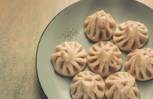 Traditional Georgian dish, Khinkali, Kalakuri, top view, rustic style, no people