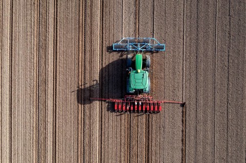 Sugar beet being sown in spring, precision sowing with precision seed drill, behind a tractor,