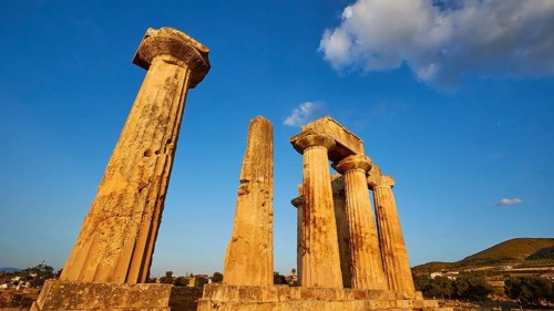 Archaic Temple of Apollo, Doric columns, Doric columns of antiquity illuminated by the warm evening