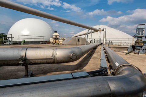 Biogas plant, gas storage, with dome, use of solid manure as energy source, gas pipelines, on a