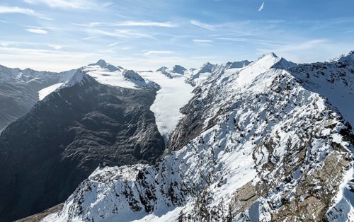 Mountain landscape with snow and glacier at Ramoljoch, glacier Gurgler Ferner, aerial view,