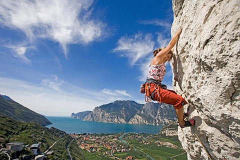 Young blonde fRau climbs on mountain, 35, years