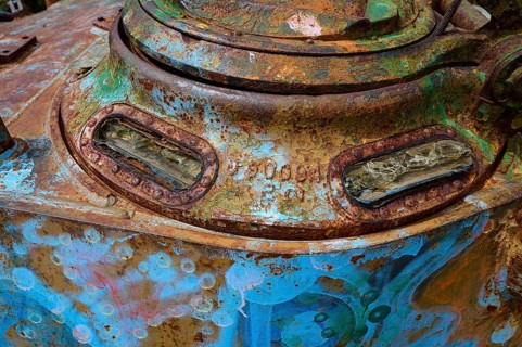 Rusty and coloured close-up of an old tank, clear traces of corrosion visible, Anthony Quinn Bay,