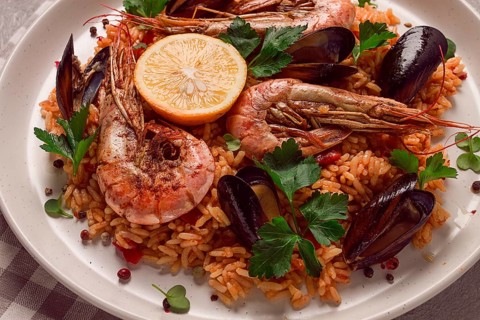 Seafood paella, shrimp and mussels risotto, rice, homemade, top view, no people