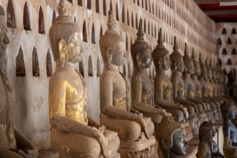 Ancient Buddha statues in the courtyard of Wat Si Saket, Vientiane, Vientiane province, Laos, Asia