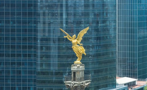Mexico City tourist attraction Angel of Independence column near financial center and El Zocalo