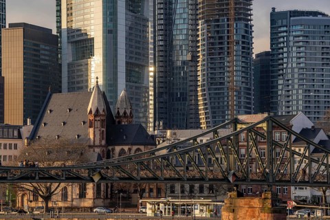Skyline of the city centre of Frankfurt am Main, river Main, Eiserner Steg bridge, dusk, Hesse,