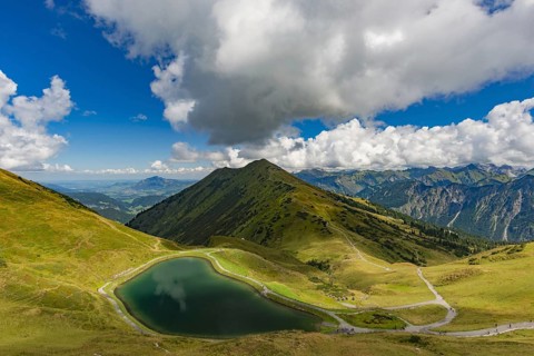 Riezler Alpsee, an artificial lake, snow pond, feeds the snow cannons that completely cover the