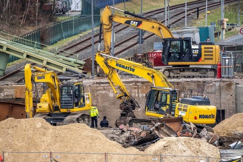 Construction site in the harbour, excavators working on a new harbour basin overpass, Bremerhaven,