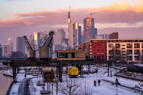 The skyline of Frankfurt am Main, skyscrapers of the banking district, historic harbour cranes at