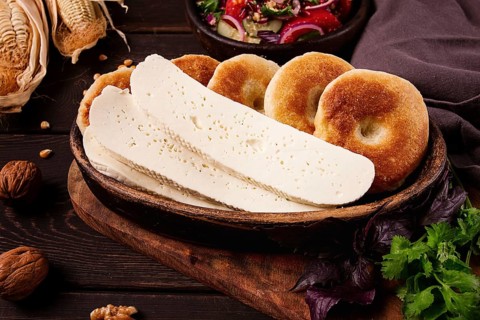 Mchadi, corn tortillas, traditional Georgian dish, corn bread, with Imeretian cheese, homemade, no