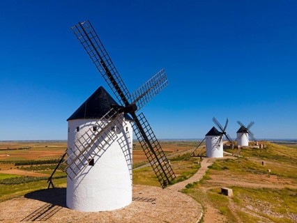 Traditional windmills in an open field under a clear blue sky, Mills, Alcazar de San Juan, PaÃ­s de