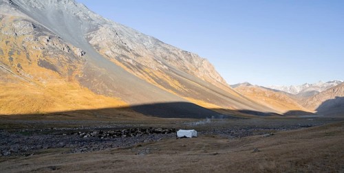 Barren landscape, mountain valley with yurt, Naryn province, Kyrgyzstan, Asia
