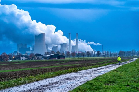 Field path, woman walking her dog, lignite-fired power plant, RWE Power AG NiederauÃŸem power